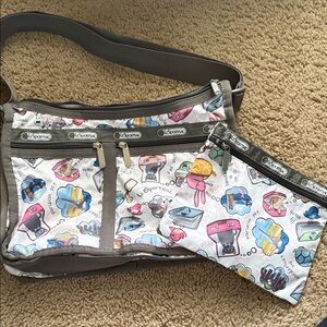 Lesportsac “Travel Pets” Crossbody purse and Pouch